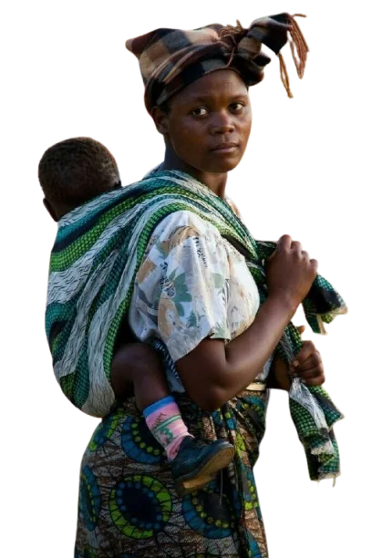 A woman standing with her baby carried in a patterned wrap on her back.